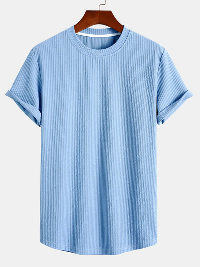 T-shirt côtelé à ourlet arrondi et coupe près du corps
