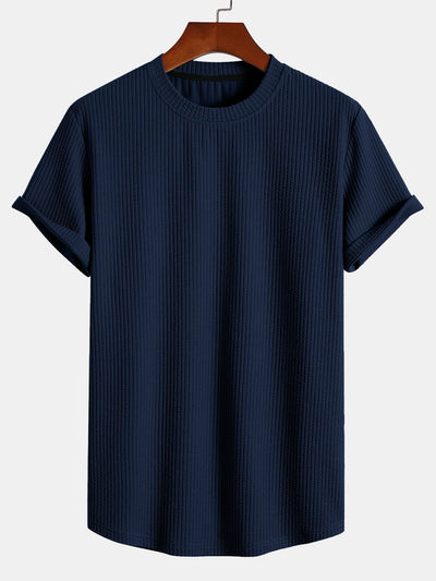 T-shirt côtelé à ourlet arrondi et coupe près du corps