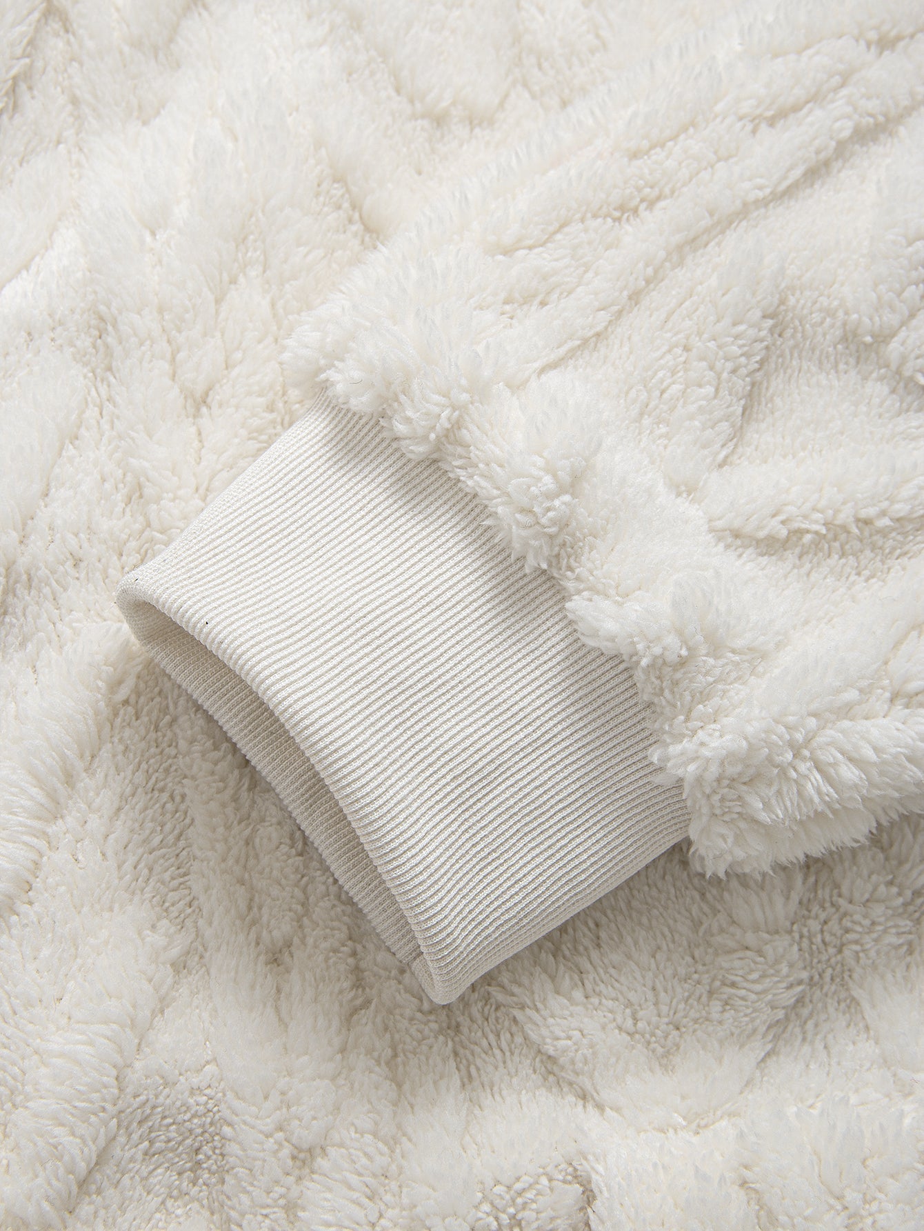 Sweat à capuche zippé en jacquard géométrique Teddy