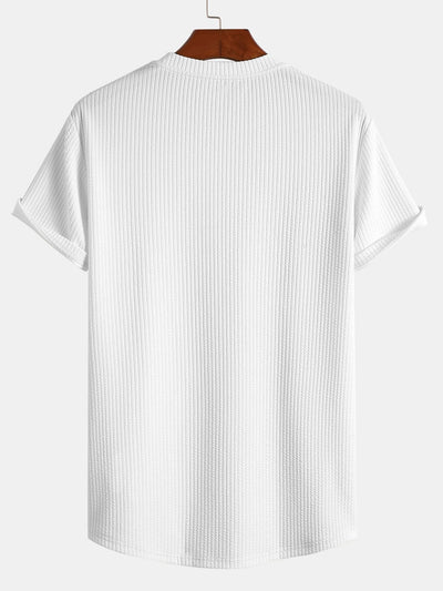 T-shirt côtelé à ourlet arrondi et coupe près du corps
