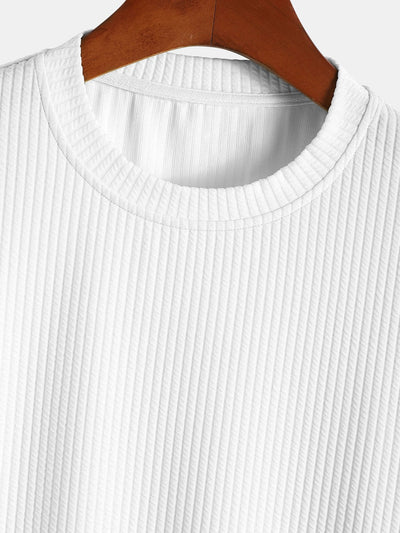T-shirt côtelé à ourlet arrondi et coupe près du corps