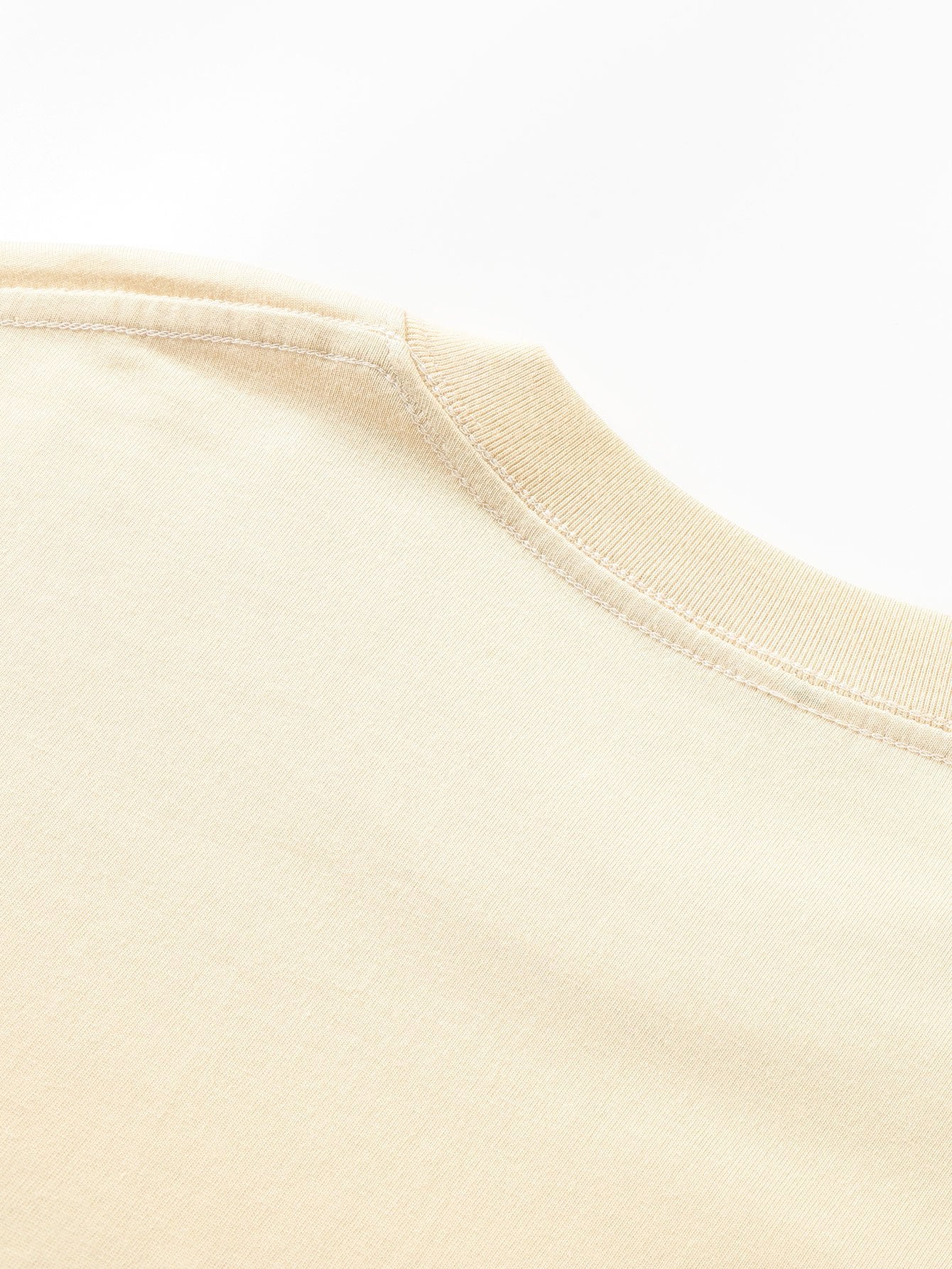 T-shirt basique à manches longues et ourlet en arc épais