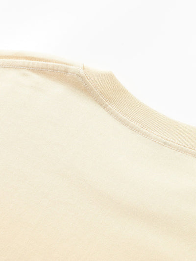 T-shirt basique à manches longues et ourlet en arc épais