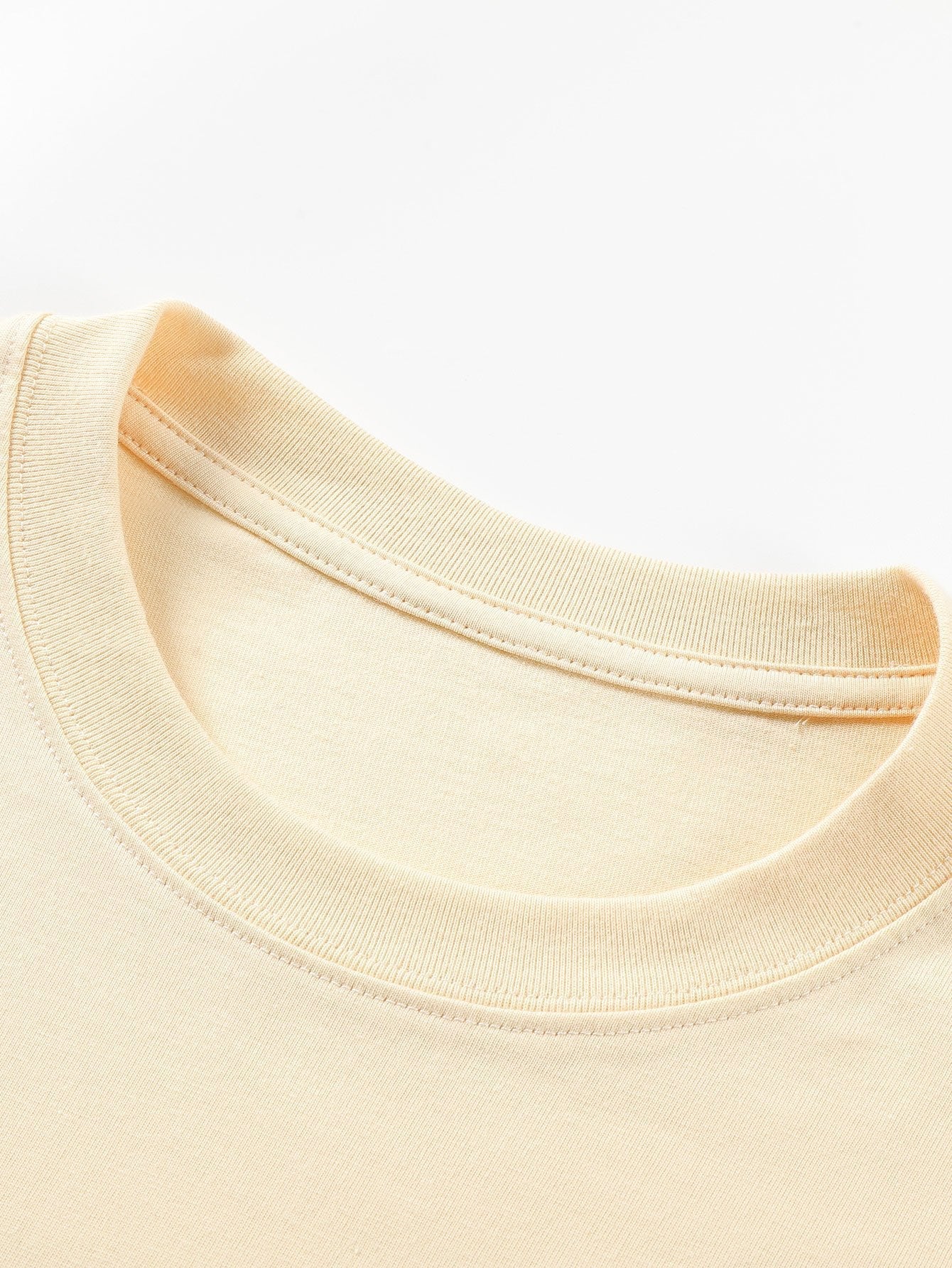 T-shirt basique à manches longues et ourlet en arc épais