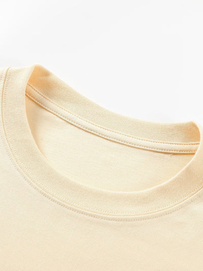 T-shirt basique à manches longues et ourlet en arc épais